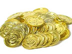 monedas doradas de plástico